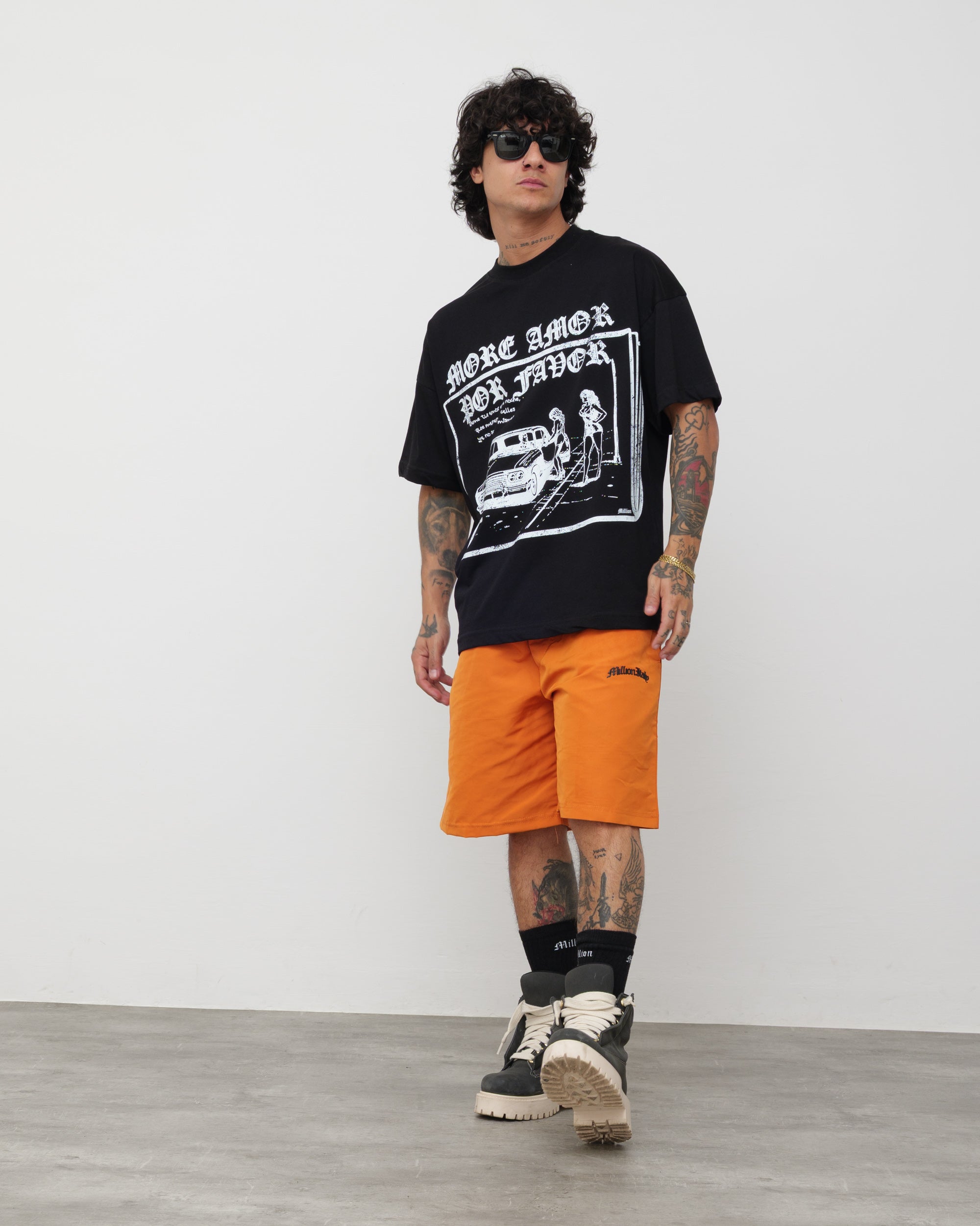 Shorts Tech Arancio - Logo Nero