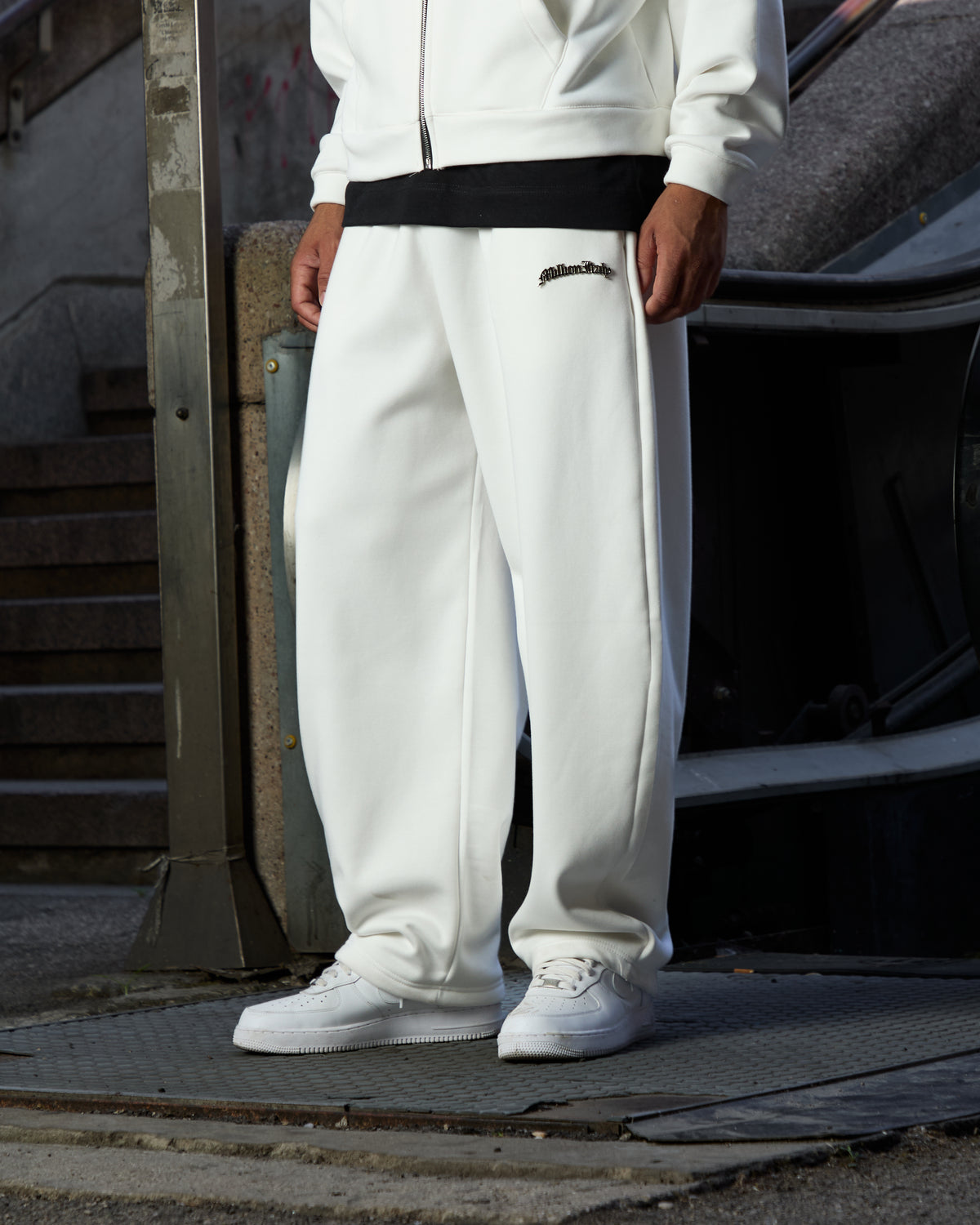 Track Logo Metal Bianca